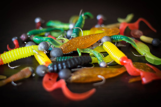 Silicone lures. Twisters on a black background - Fotografie, Obrázek