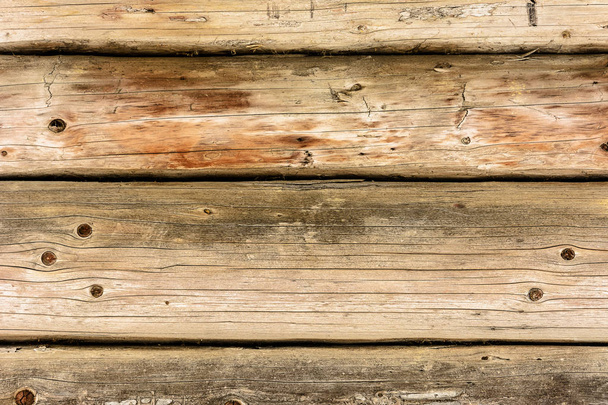 Magnificent background of a textured old wall made of brown wooden beams - Photo, Image