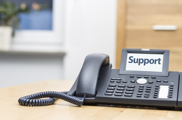 μοντέρνο τηλέφωνο με τη λέξη - υποστήριξη - στην οθόνη - Φωτογραφία, εικόνα