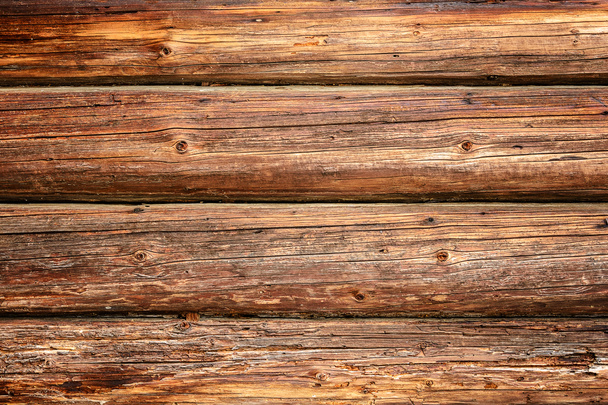 Magnificent background of a textured old wall made of brown wooden beams - Photo, Image