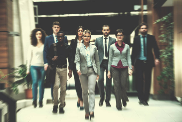 young multi ethnic business people group walking standing and top view - Φωτογραφία, εικόνα
