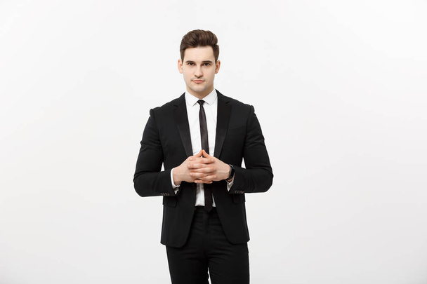 Business Concept - Ritratto Bello Uomo d'affari in giacca e cravatta che si tiene per mano con viso sicuro. Sfondo bianco
. - Foto, immagini