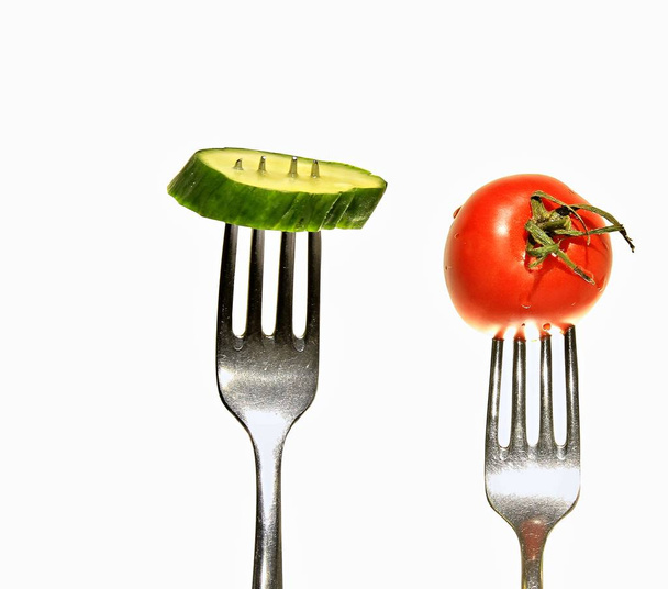 cucumber tomato with fork - Photo, Image