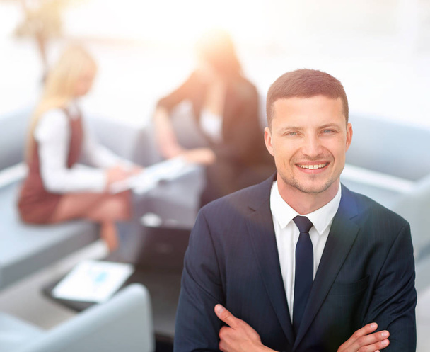 young businessman on blurred background office. - Photo, Image