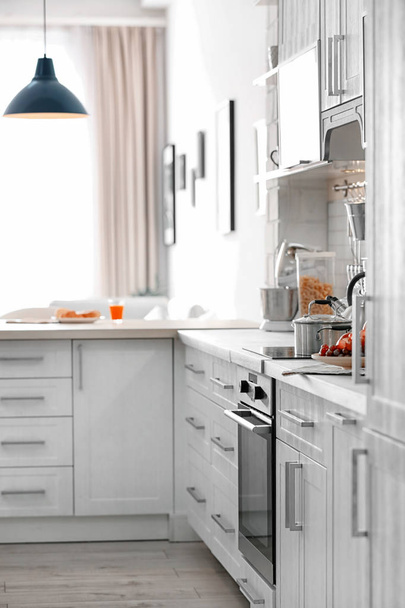 Modern kitchen interior in light apartment - Photo, Image