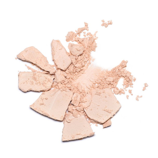 A sample of face powder in white. Beige round cracked powder palette - Photo, Image