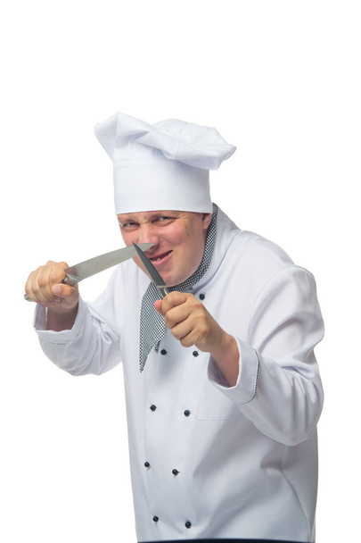 angry cook holding knives, on white background - Foto, afbeelding