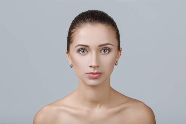 girl with clean skin and natural makeup - Fotó, kép