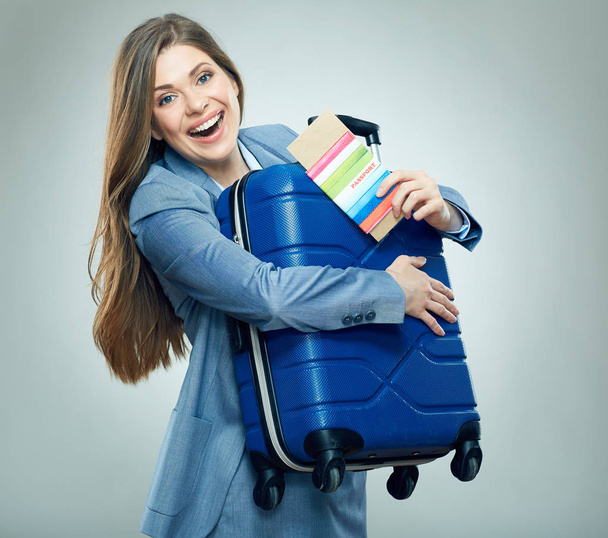 Happy business woman ready for trawel with suitcase.  - Valokuva, kuva