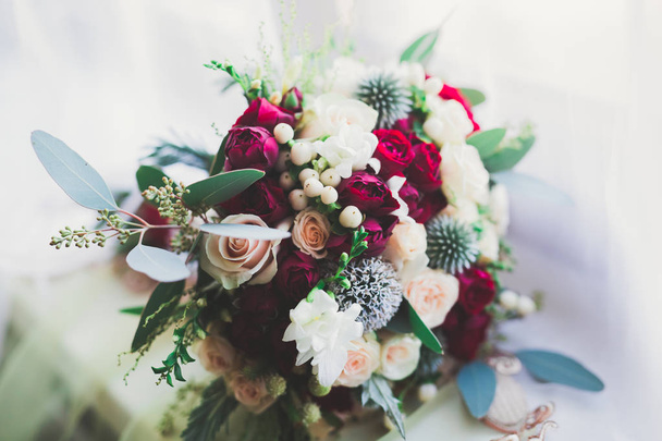 Beautiful wedding bouquet with different flowers, roses - Photo, Image