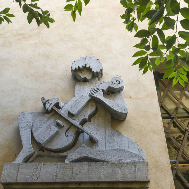 Скульптура на стіні, Орв'єто, провінція Терні, Умбрія, Італія - Фото, зображення