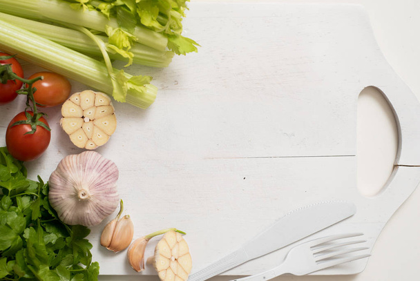 vegetables ingredients. celery parsley and garlic.preparing food, healthy eating. Copy space top view - Φωτογραφία, εικόνα