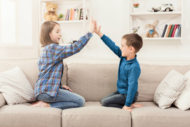 Play clapping hands together, children game - Foto, Imagen