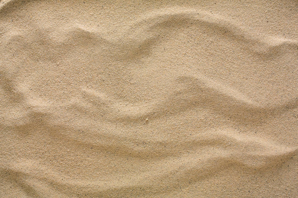 Tło plaża piasek. Pobrzeże naturalne tekstury powierzchni - Zdjęcie, obraz