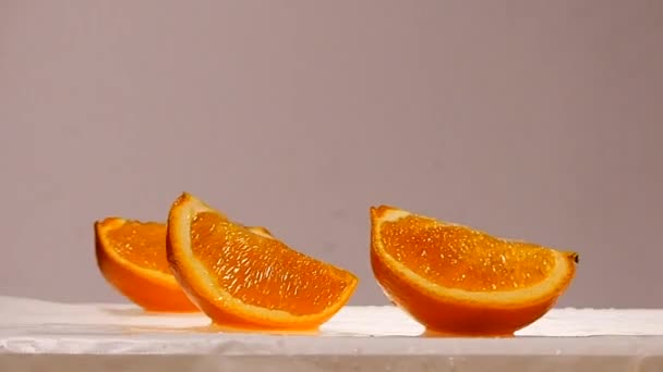Scheiben Orangenfrüchte in Zeitlupe - Filmmaterial, Video