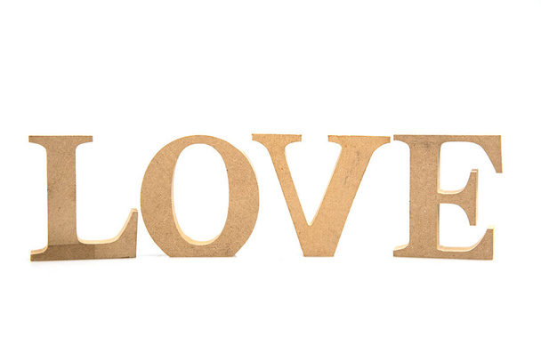 η λέξη αγάπη απομονώθηκε σε λευκό φόντο - Φωτογραφία, εικόνα