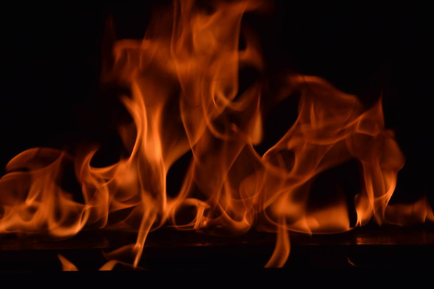 Abstract Fire flames isolated on black background - Valokuva, kuva