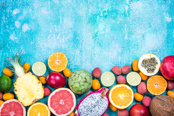 Frutti esotici freschi misti, sfondo bordo
 - Foto, immagini