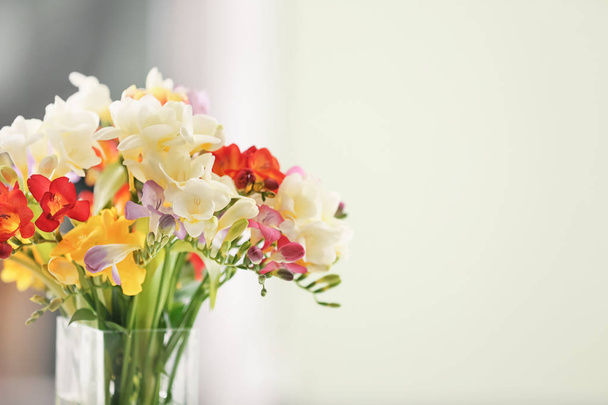 Beautiful bouquet of freesia flowers on blurred background - Fotografie, Obrázek