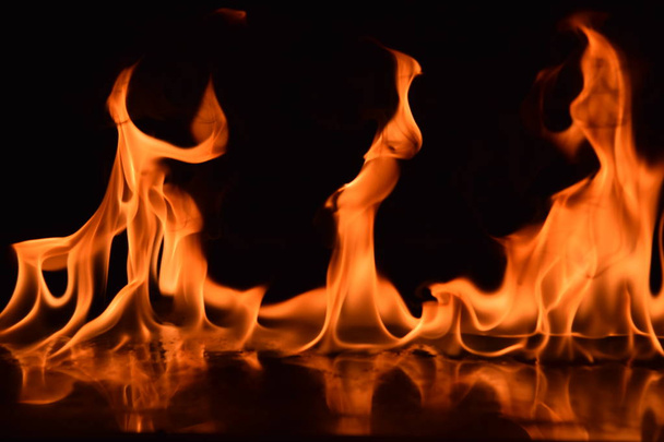 Abstract Fire flames isolated on black background - Foto, Bild