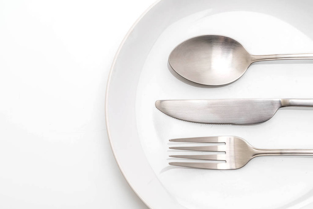 empty plate spoon fork and knife - Фото, зображення