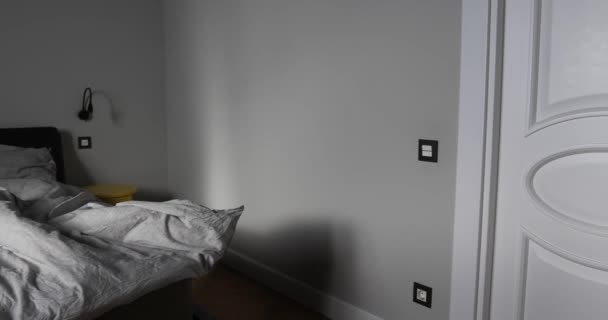 Interior of bedroom with unmade bed - Footage, Video