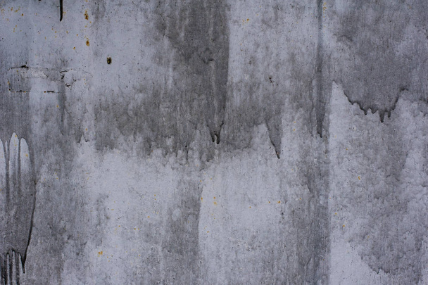 Tekstuuri vintage ruosteinen harmaa rautaseinä tausta monia kerroksia maalia ja ruostetta
 - Valokuva, kuva