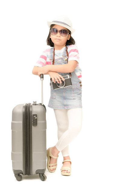 Happy traveler girl with suitcase.  - Fotografie, Obrázek