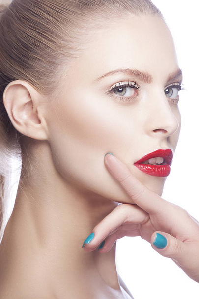 Portrait of woman with red lips and blue nail polish - Foto, Imagen