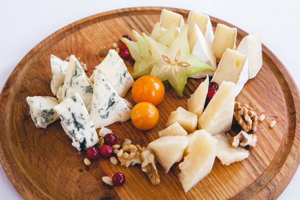 snack with slices of cheese and vegetables - 写真・画像