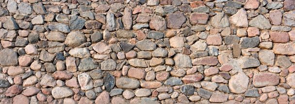 Stone wall rustic texture background. old granite wall - Photo, Image