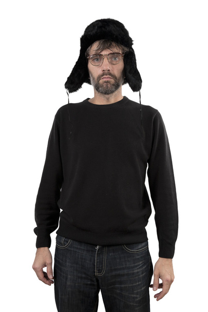 Hombre con gorro orejeras y gafas
 - Foto, imagen
