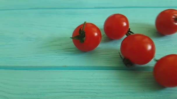 cherry tomatoes on a wooden - Footage, Video