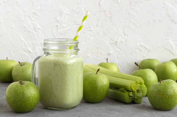 Healthy detox green smoothie in a mason jar. - Fotó, kép