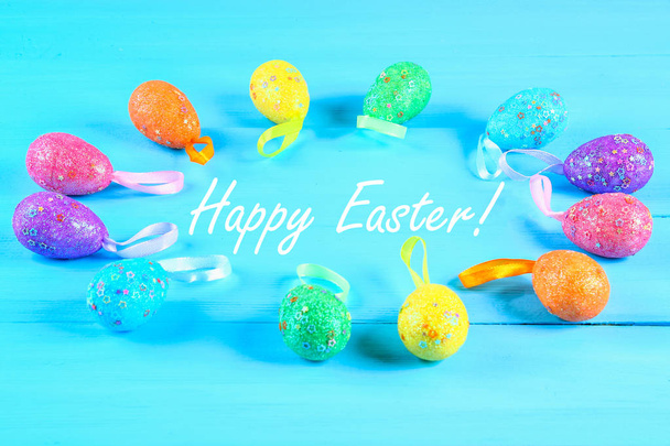 Colorful easter egg on blue pastel color wood background with space. Happy easter. - Fotoğraf, Görsel