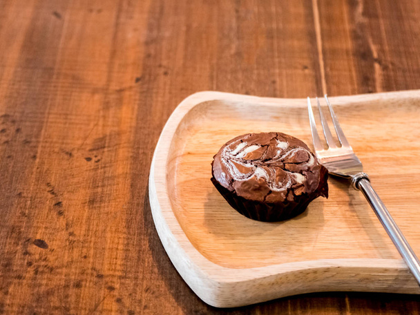 Homemade artisan dark chocolate brownies , on wood dish - Foto, Imagem