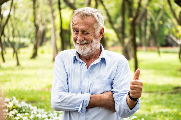 Portrait of senior man smiling with happiness. Elderly concept - Photo, Image