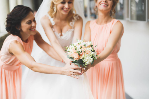 Bride holding big and beautiful wedding bouquet with flowers - Foto, Imagem