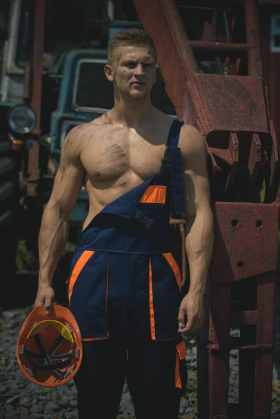Man, builder or bodybuilder with strict face. - Foto, Bild