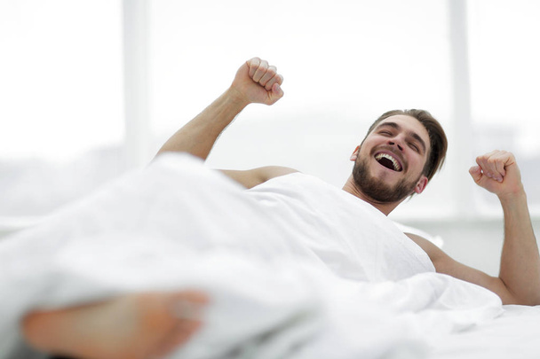 happy man waking up in the morning - Foto, imagen