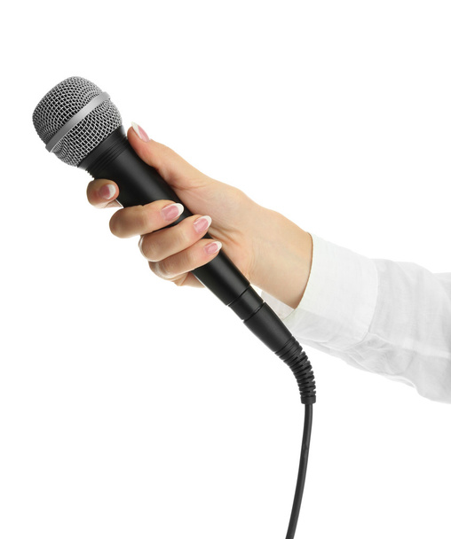 female hand with microphone isolated on white - Zdjęcie, obraz