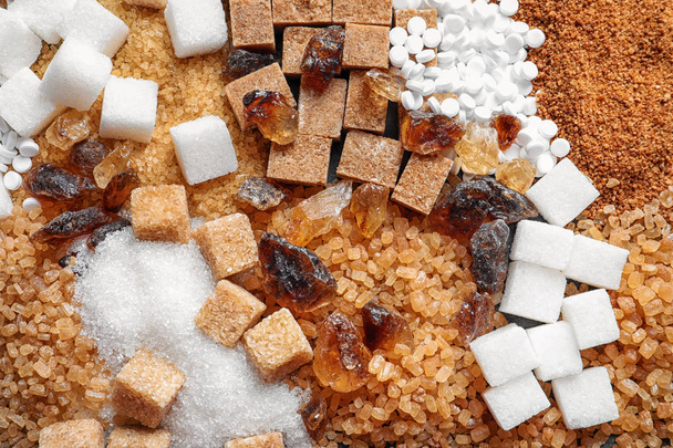 Different types of sugar as background - Photo, Image