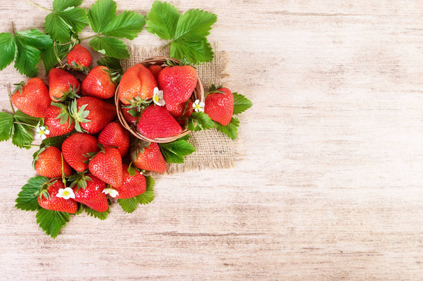 Fresh bright tasty strawberry close-up.Text space, top view. - Foto, immagini