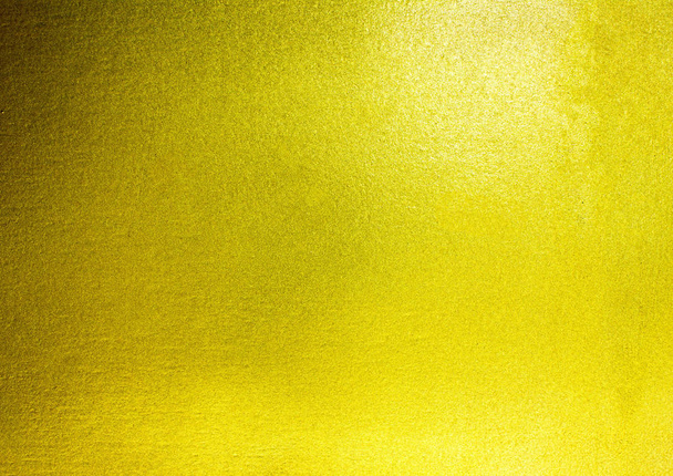 Lesklý žlutý list zlaté fólie textury pozadí. - Fotografie, Obrázek