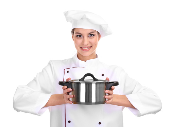 Portrait of young woman chef with pan isolated on white - Foto, afbeelding