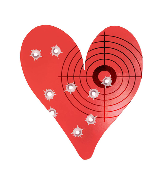 Пули в металлической мишени в форме сердца
 - Фото, изображение