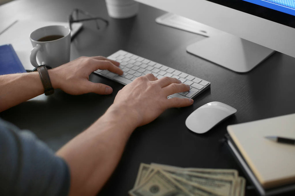 Man working with computer in office. Forex concept - Foto, imagen