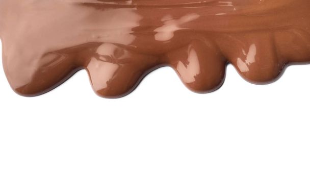Chocolate fundido sobre fondo blanco
 - Foto, Imagen