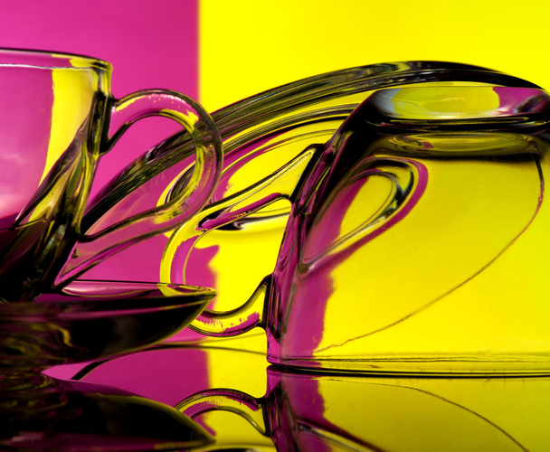 Glass goblets on a colored background - Foto, Imagem