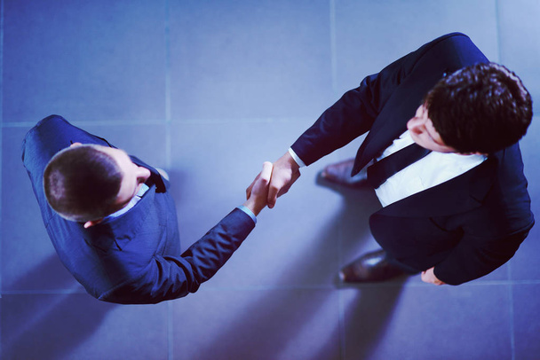 business people shaking hands make deal and sign contract - Fotografie, Obrázek